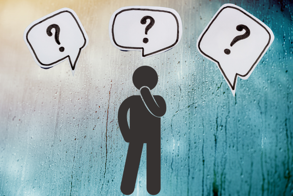 A stick figure pondering window condensation and asking questions if it is normal.