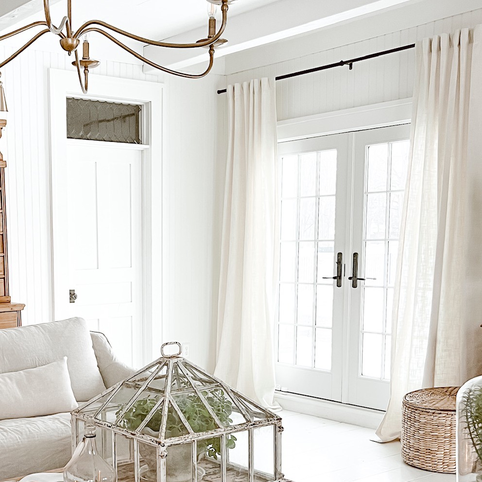 Cozy White Cottage owner Liz Marie Galvan shows off her a-series inswing french doors in white with oil rubbed bronze hardware