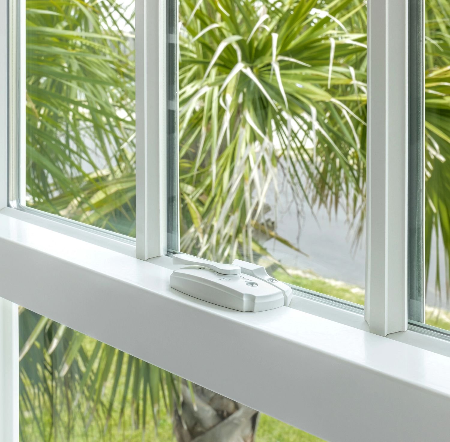 Closeup of coastal window hardware.