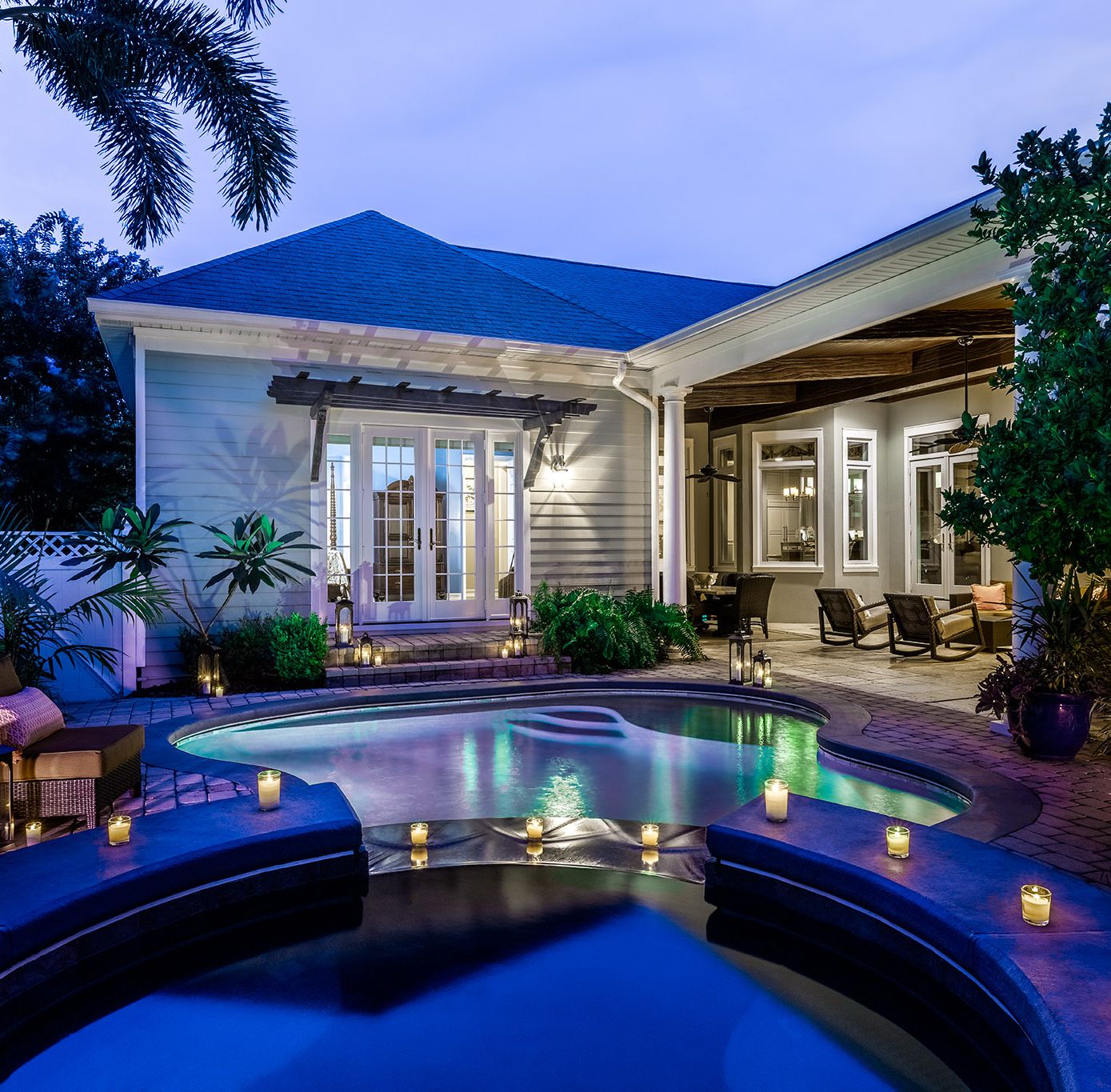 A view of a pool area with windows.