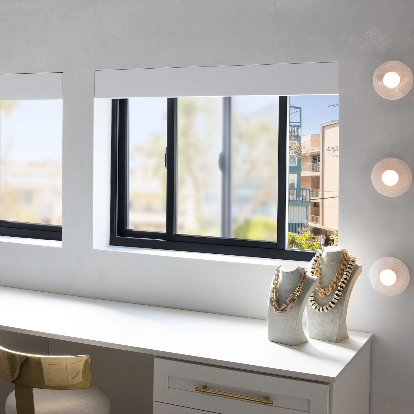 Breegan Jane's dressing room has a bank of sliding windows above the counter.