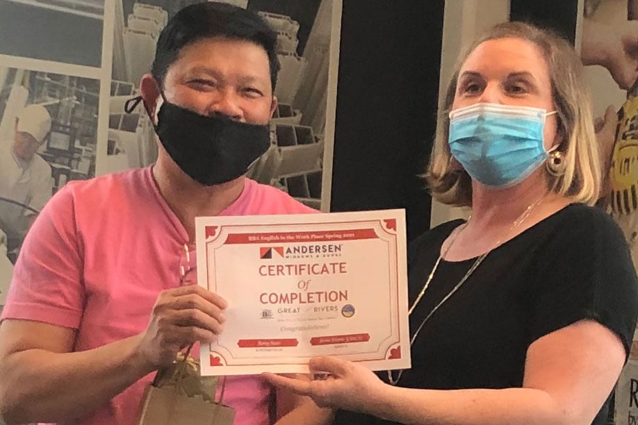 ESL program changes lives. Certificates being displayed